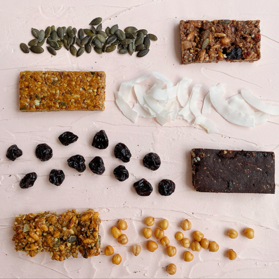 organic, gluten free muesli bars. High protein, vegan healthy snacks with cranberry, chickpeas, sunflower seeds, pepitas, flax seeds, sesame. Chai spices with cinnamon, ginger, cloves and cardamom